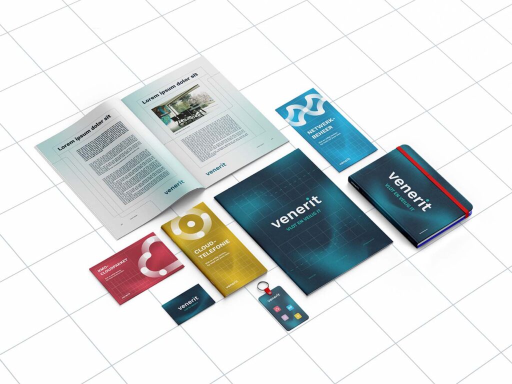 A mockup of some folders and printed cards to show the branding of Venerit.